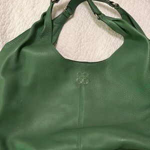 Authentic Coach green Hobo bag w/tags. In excellent shape w/dust cover.